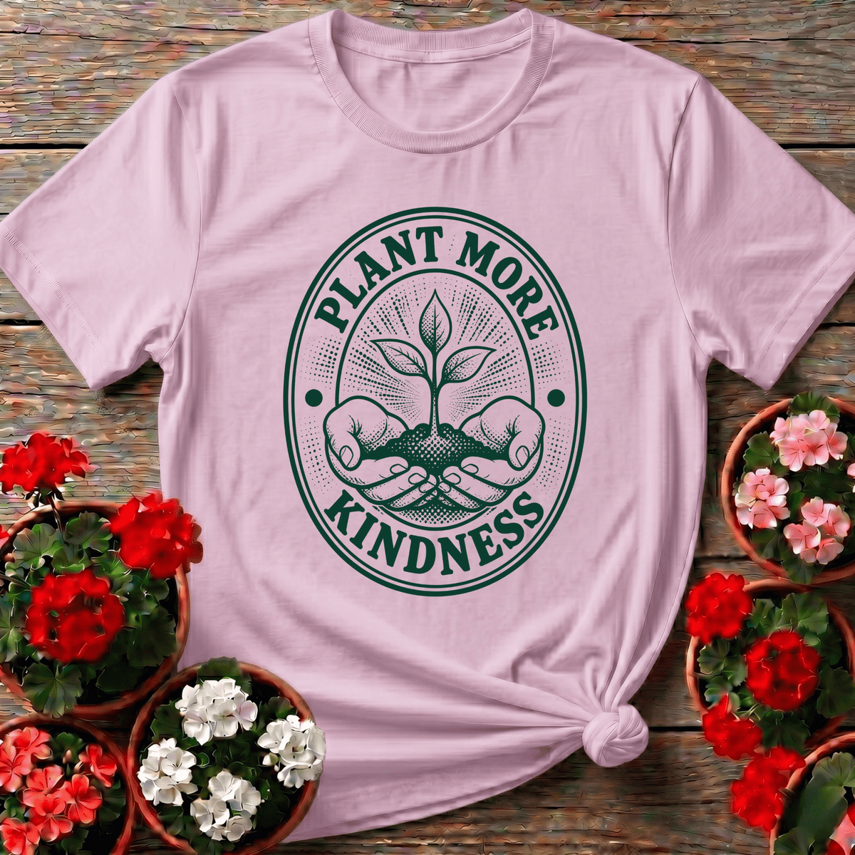 Light Pink cottagecore oval seal gardening shirt with "Plant More Kindness" cupped seedling for garden gift giving