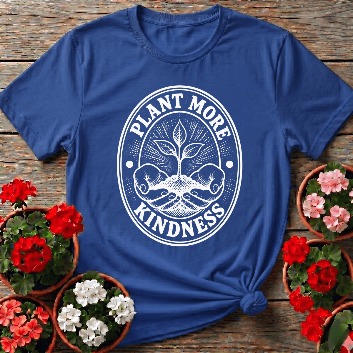 Royal retro badge style gardening shirt with bold "Plant More Kindness" seedling graphic for garden enthusiasts