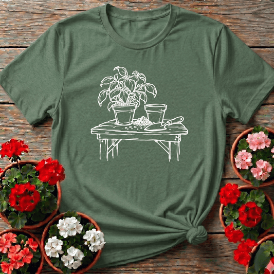 Military Green sketch-style gardening tee with potting bench basil and trowel illustration for plant growers
