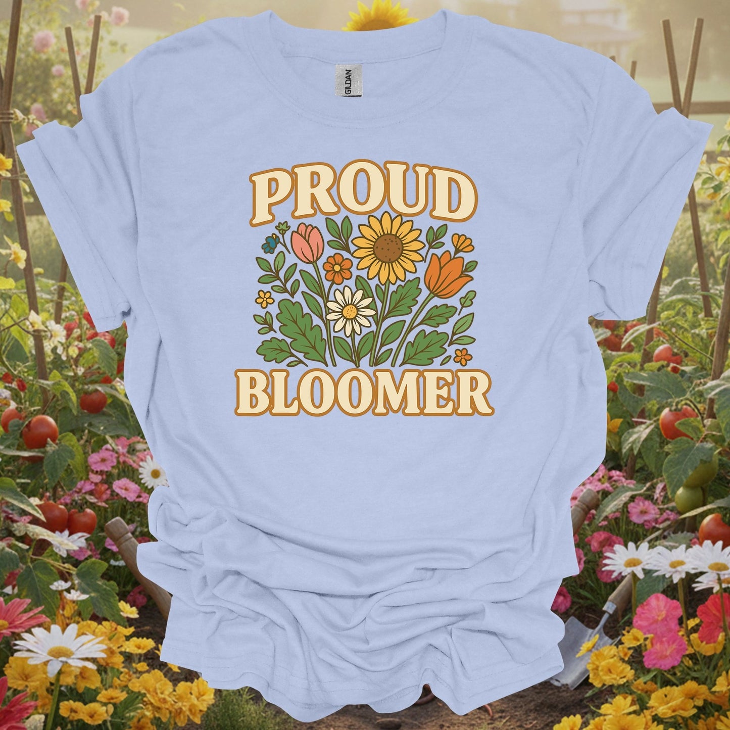 Light Blue shirt showing proud bloomer floral bouquet slogan for home gardeners