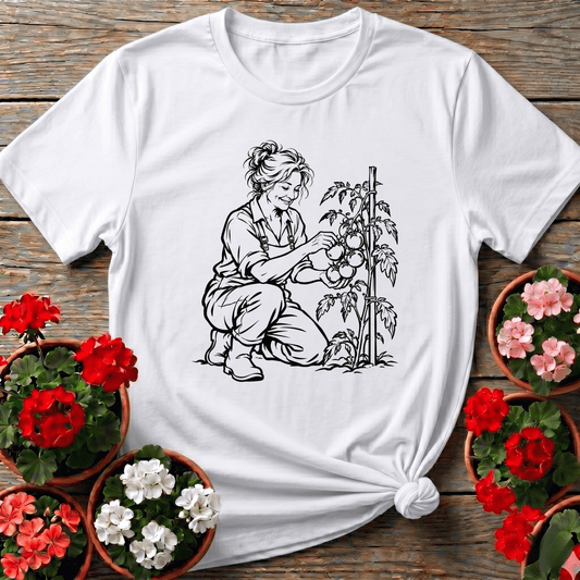 White cottagecore botanical illustration gardening shirt of a woman harvesting tomatoes for home gardeners