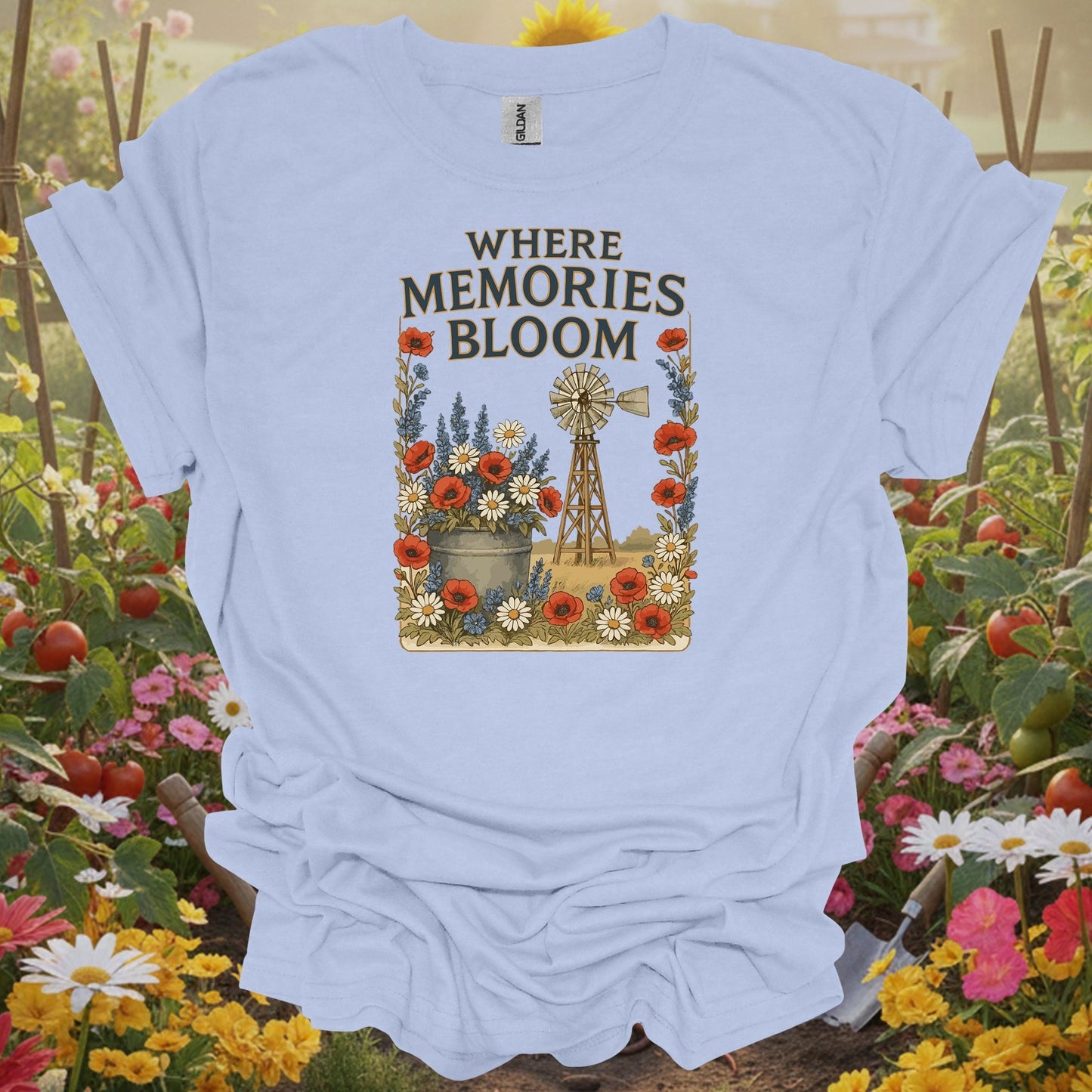 LIght blue tshirt showing a traditional windmill aesthetic that captures the restorative power of a life lived close to the earth for economists calculating cost savings